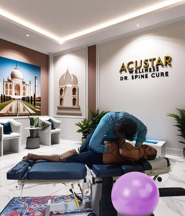 Patient experiencing sciatica pain relief through chiropractic care at AcuSTAR, Bangalore